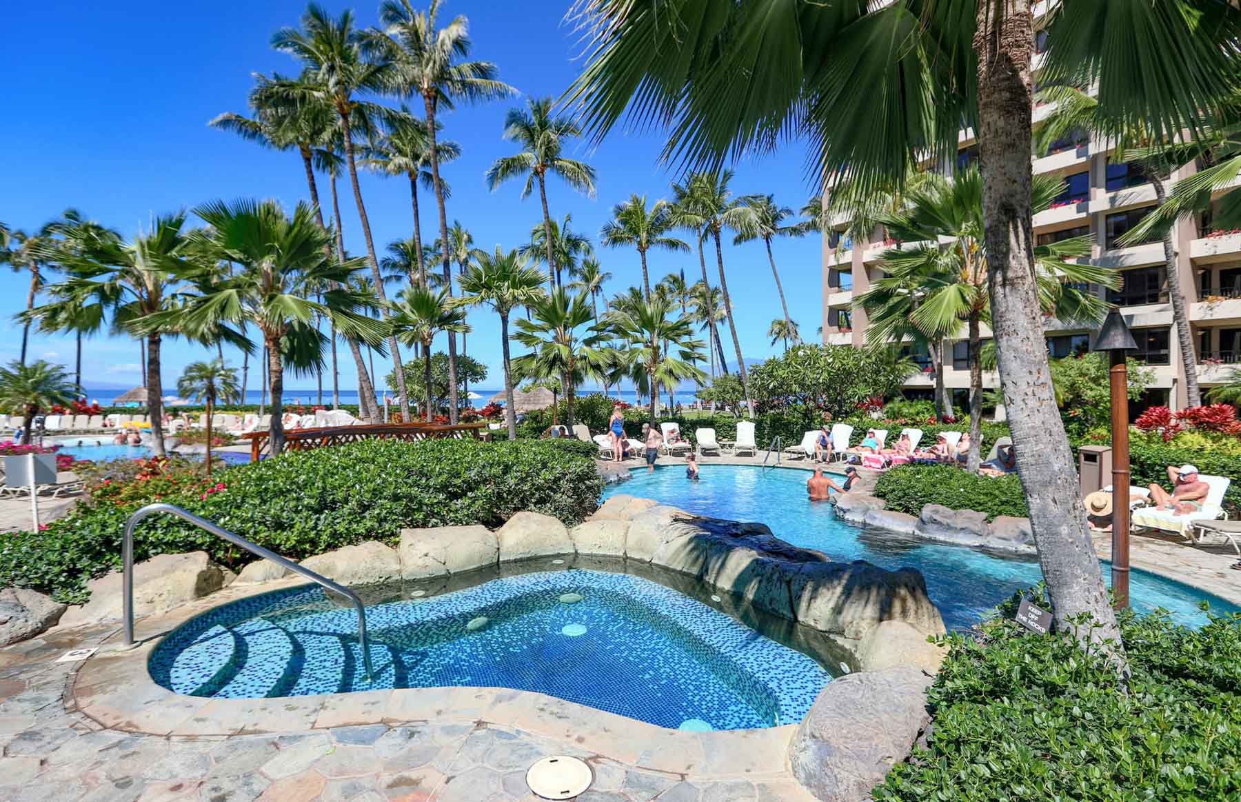 Maui Tropical resort with wading pool and palm trees