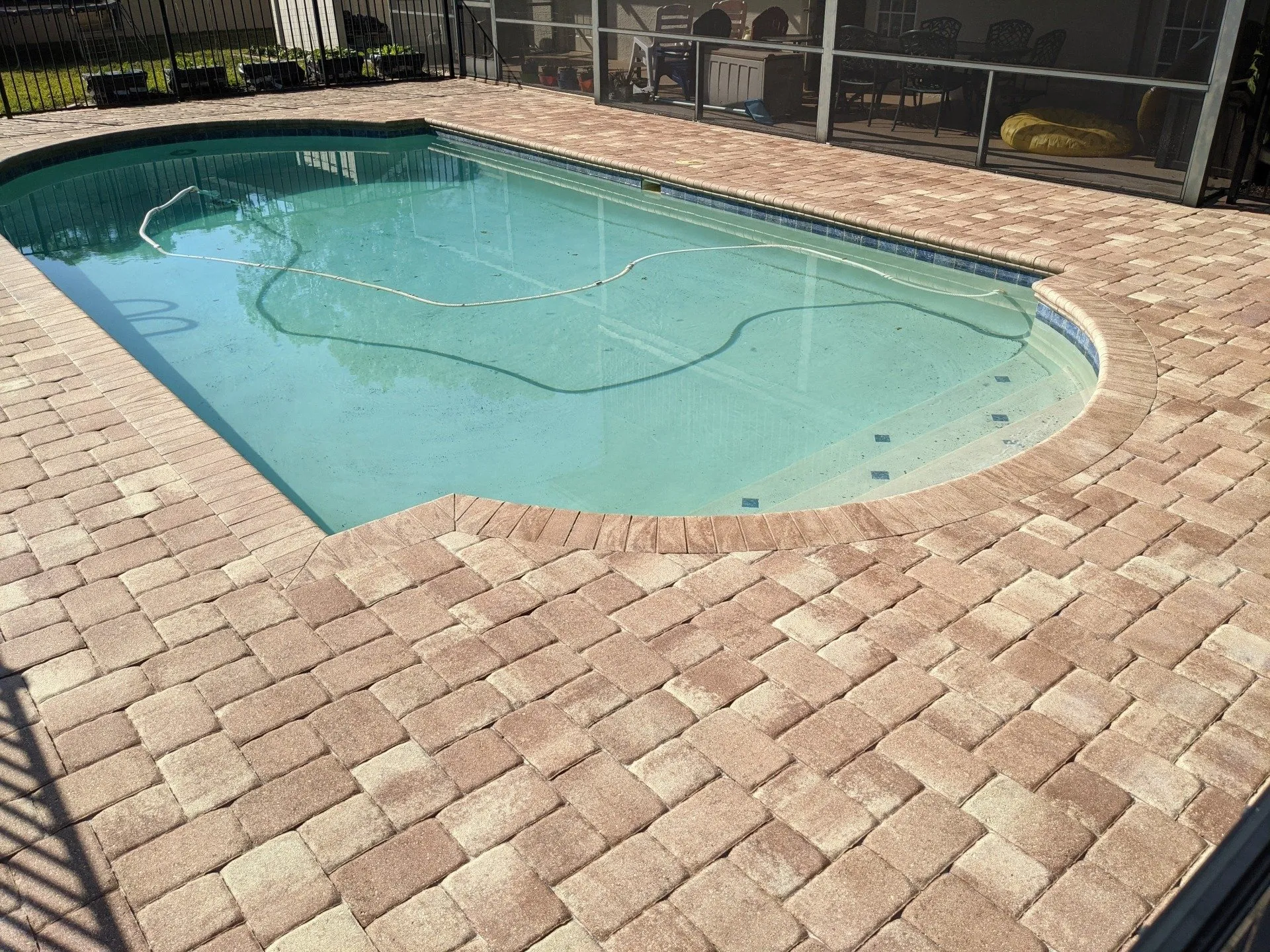 Pool deck paver sealing