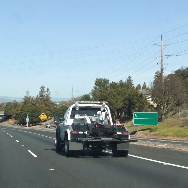 White towing truck